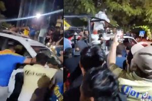 Aficionados de América mueven camioneta de la Guardia Nacional durante los festejos del bicampeonato