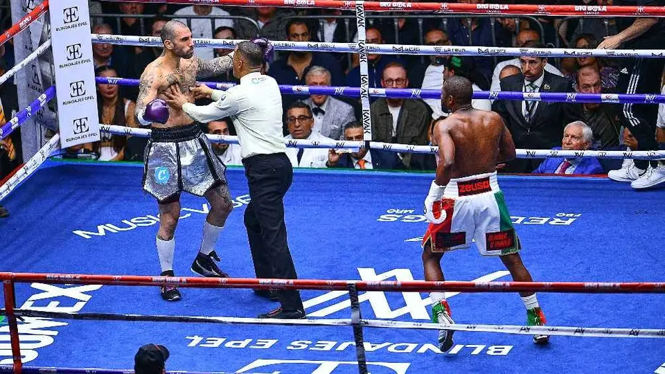 Floyd Mayweather y John Gotti protagonizaron combate de pocas emociones