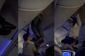 Turbulencia provoca que pasajero quede atorado entre los maleteros y el techo del avión