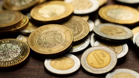 Usar una moneda falsa es un delito federal que se castiga con cárcel / FREEPIK