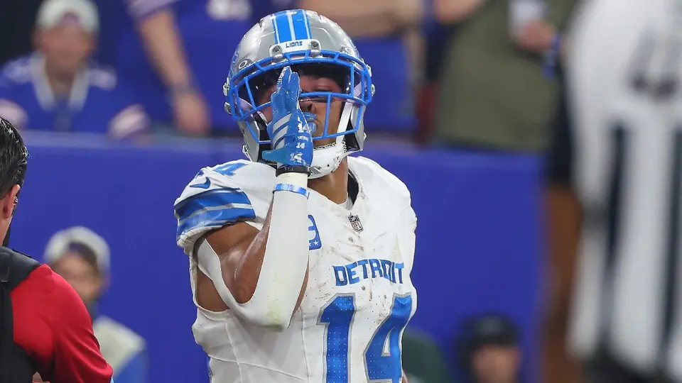 Amon-Ra St. Brown, receptor de los Lions, celebrando TD ante los Bills | AP