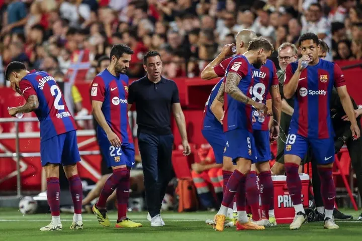 Xavi y varios jugadores del Barcelona | AP