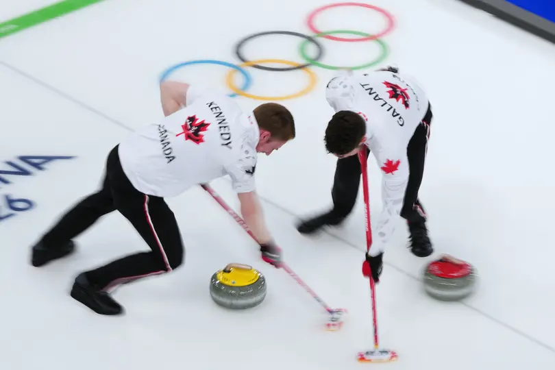 Jugadores de Canadá en la competencia de curling | AP