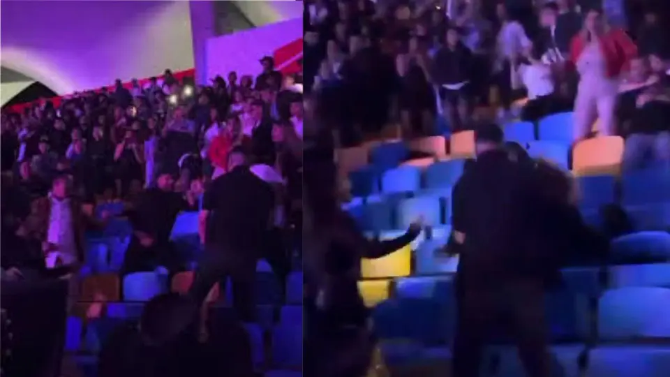 Mujeres fueron empujadas durante la pelea en concierto de Grupo Firme en Honduras./ Captura de pantalla