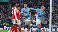 Nico O'Reilly en celebración con Erling Haaland en la Final de la Carabao Cup entre Arsenal y Manchester City | AP