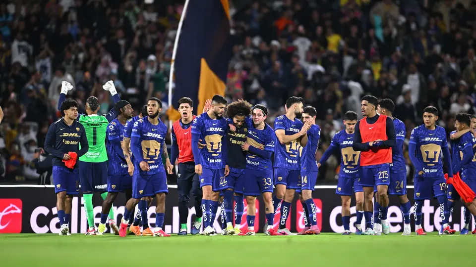 Pumas celebrando su victoria ante el América | MEXSPORT