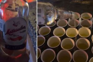 Maratón CDMX 2022: Hombre echó 'ron' en vasos de agua para atletas