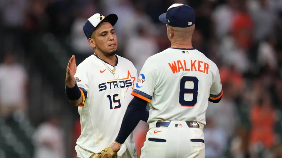 Isaac Paredes y Christian Walker | AP