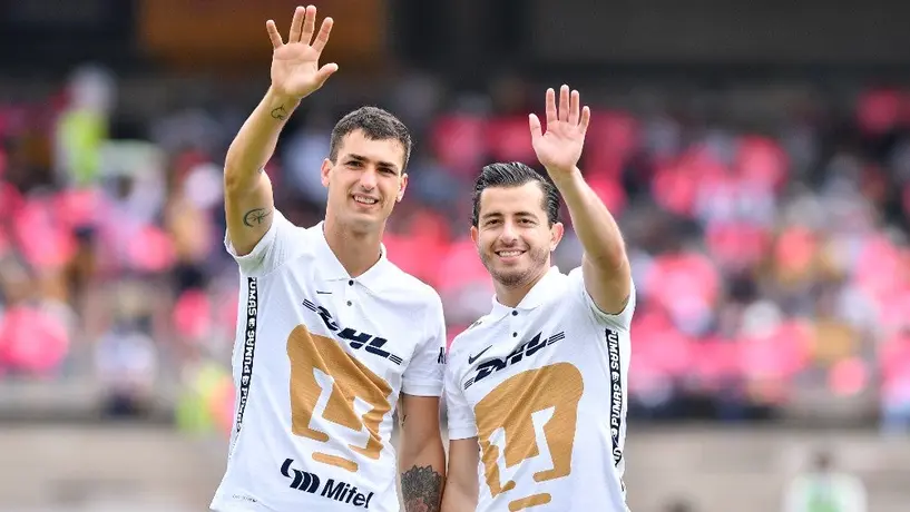 Pumas: Alan Mozo y Juan Dinenno donaron juguetes a un albergue