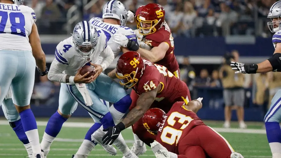 NFL: Allen y Payne pelearon en la banca de Washington durante el juego vs Dallas