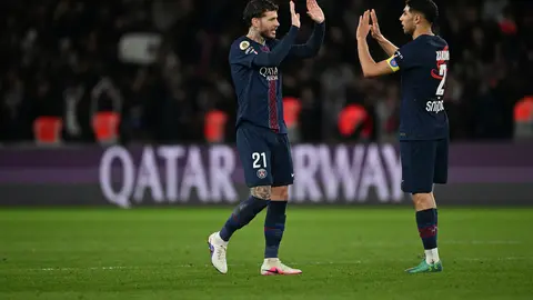 Lucas Hernández y Hakimi durante un partido de PSG en la Ligue 1 | AP