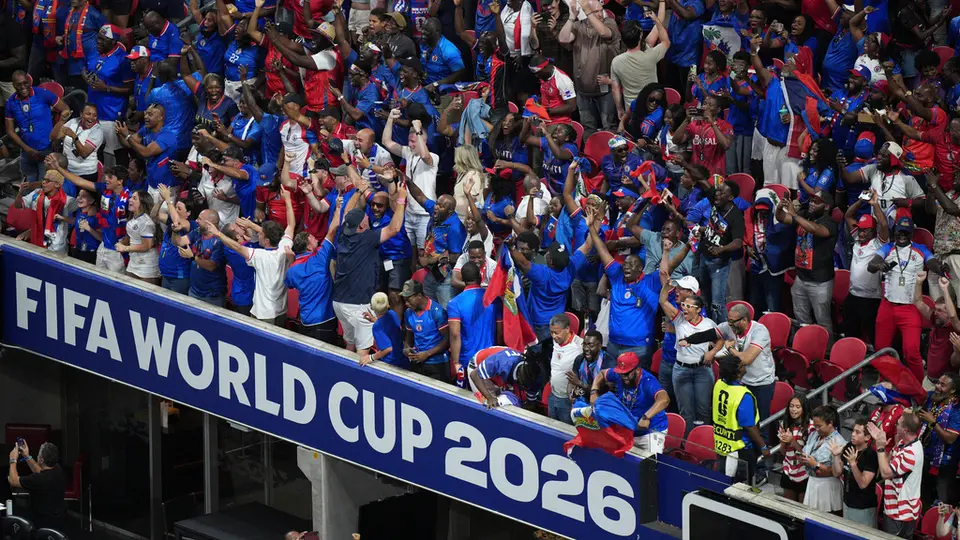 Aficionados de Haití celebrando su primer gol en Mundiales en 52 años | AP