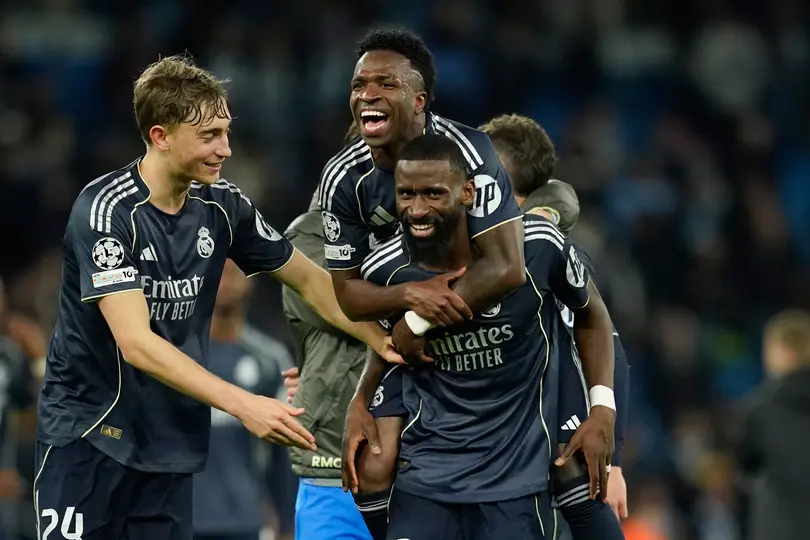 Vinicius celebra con Antonio Rüdiger en la Champions League | AP