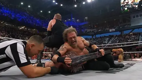 Adam Copeland y Christian sometiendo a FTR | AEW