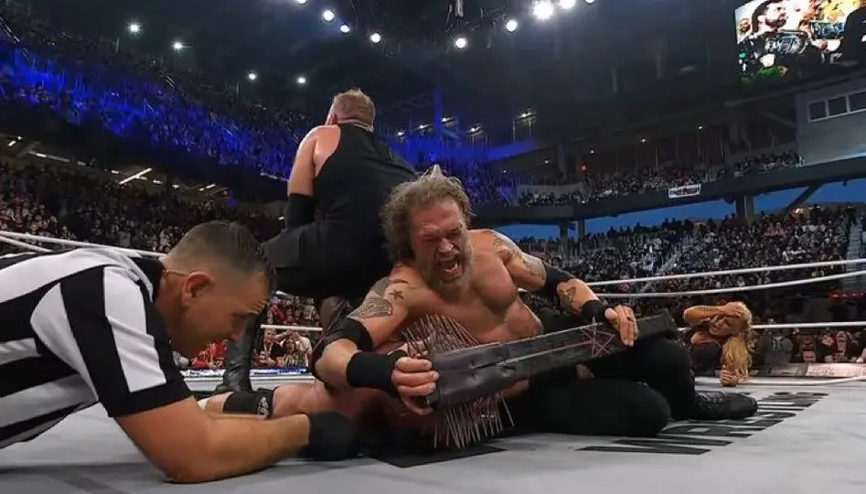 Adam Copeland y Christian sometiendo a FTR | AEW