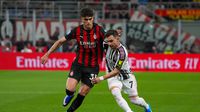 Davide Bartesaghi y Francisco Conceicao en el partido de AC Milan contra Juventus | AP
