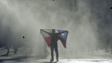 Aficionados de Colo Colo, U. de Chile y U. Católica se unieron en megamarcha en Chile