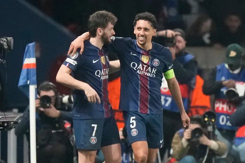 Marquinhos y Kvaratskhelia festejan uno de los goles del PSG vs Mónaco en la Champions League | AP