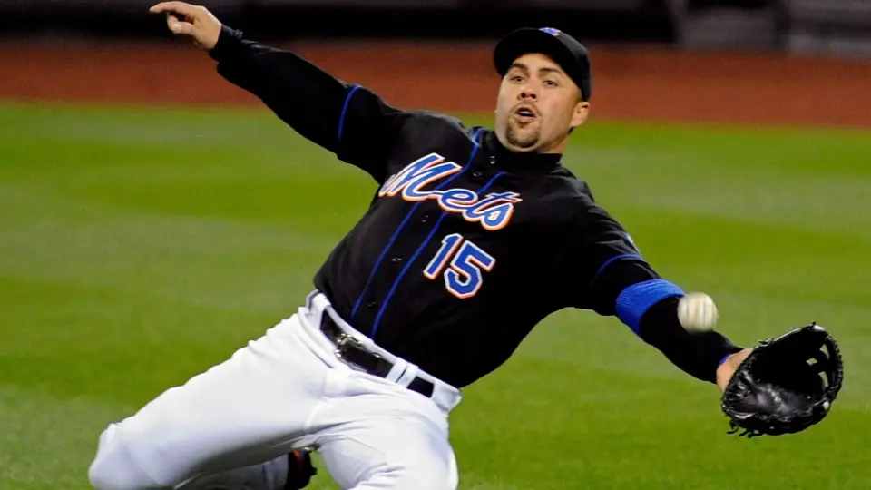 Carlos Beltrán se desliza por pelota en juego con los Mets ante los Diamondbacks en 2011 | AP