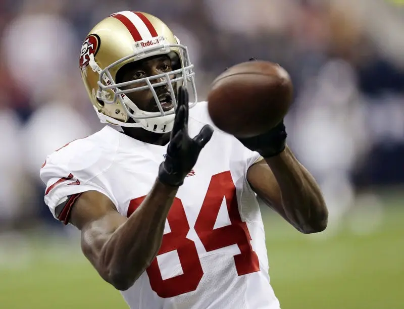 Randy Moss atrapa un pase con 49ers