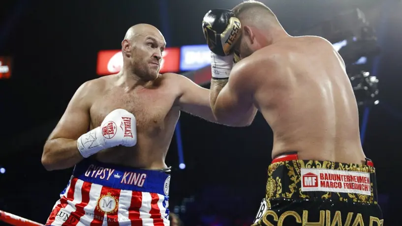 Tyson Fury retiene título peso pesado en dos rounds