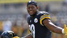 Aquino 'convierte' a JuJu Smith-Schuster en fan de Tigres