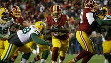 Redskins propina paliza a Packers y respira en la temporada