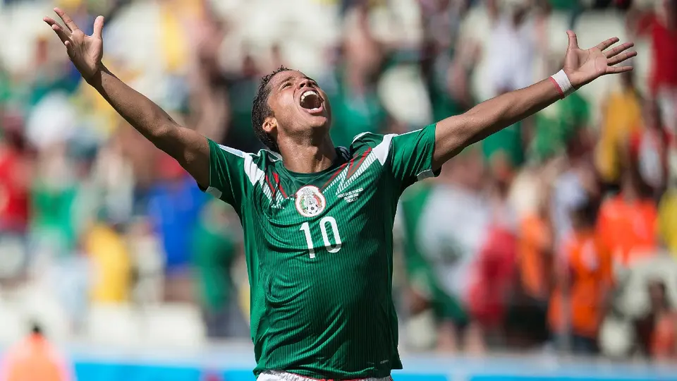 Giovani Dos Santos celebrando anotación ante Holanda en Brasil 2014 | MEXSPORT