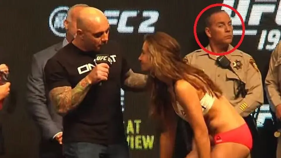 Guardia de seguridad se da 'taco de ojo' con Miesha Tate