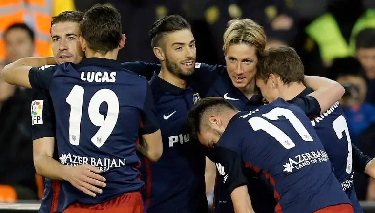 El Niño Torres y sus compañeros celebran un gol del Atlético | EFE