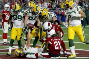 Rodgers repite 'Ave María' en juego contra Arizona