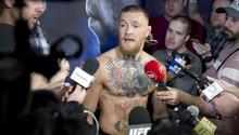 Pesaje McGregor-Díaz termina con bronca entre aficionados
