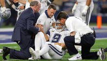 Tony Romo, fuera toda la temporada por lesión