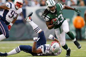 Fan de Jets golpea a uno de los Patriotas