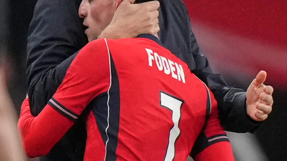 Phil Foden abrazando a Thomas Tuchel l AP