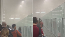 Momentos de tensión en el AICM por presencia de humo en zona de abordaje / VIDEO