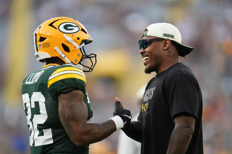 Marshawn Lloyd y Josh Jacobs | AP