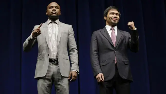 Pacquiao y Mayweather en la presentación de su combate en 2015 | AP