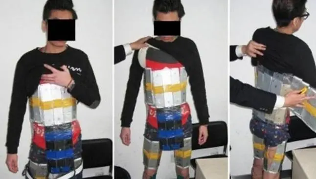 Joven intenta entrar a China con 94 iPhones pegados al cuerpo