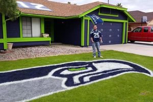 Aficionado pinta su casa con colores de Halcones Marinos