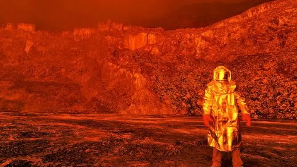 Científicos caminan sobre cráter de un volcán