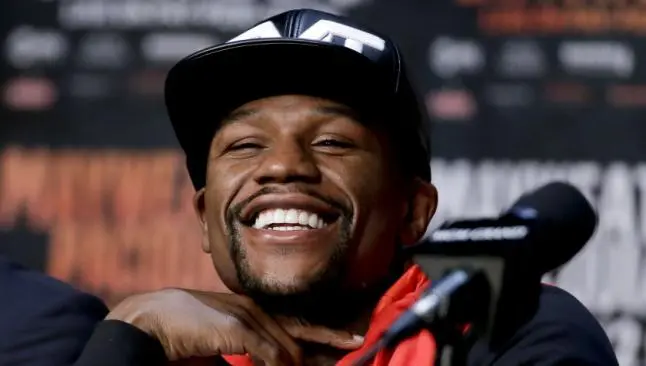 'Rousey es un hombre, no será abuso si le hago daño': Mayweather