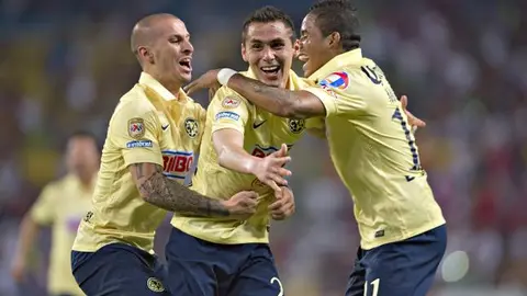 América derrota al Atlas y trepa al liderato