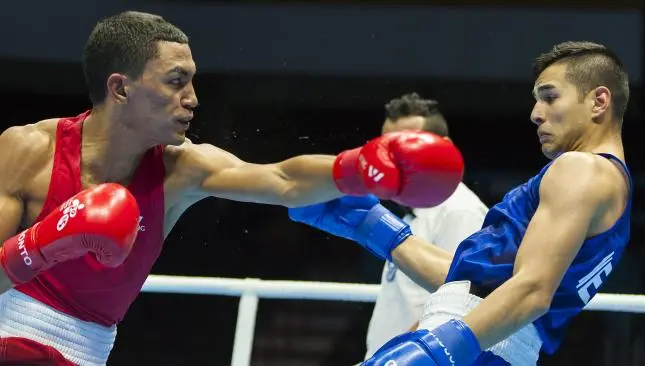 Lindolfo Delgado gana Plata en box