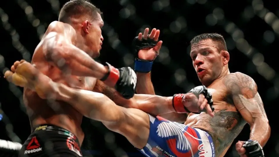 Dos Anjos y Jedrzejczyk se coronan en UFC 185