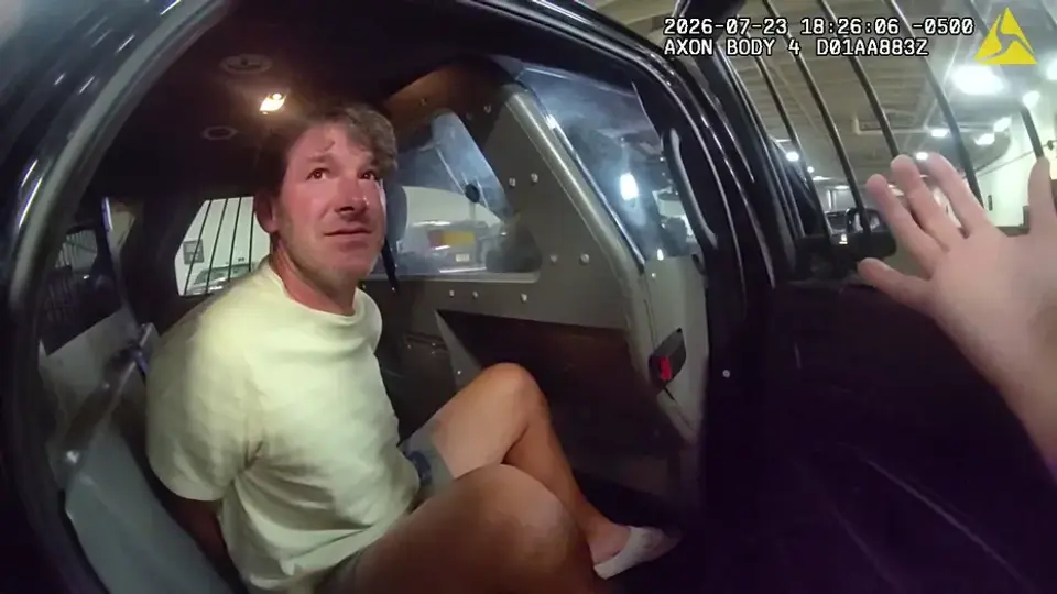 Tony Romo mientras era detenido | Captura