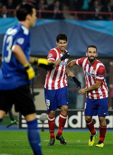 Diego Costa celebra tras su anotación con el Atlético, contra el Austria Viena | AP