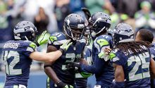 De la mano de Wilson, Seattle mantiene su récord perfecto