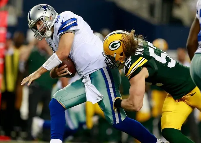 Romo baja su rendimiento en diciembre con Dallas