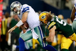 Romo baja su rendimiento en diciembre con Dallas